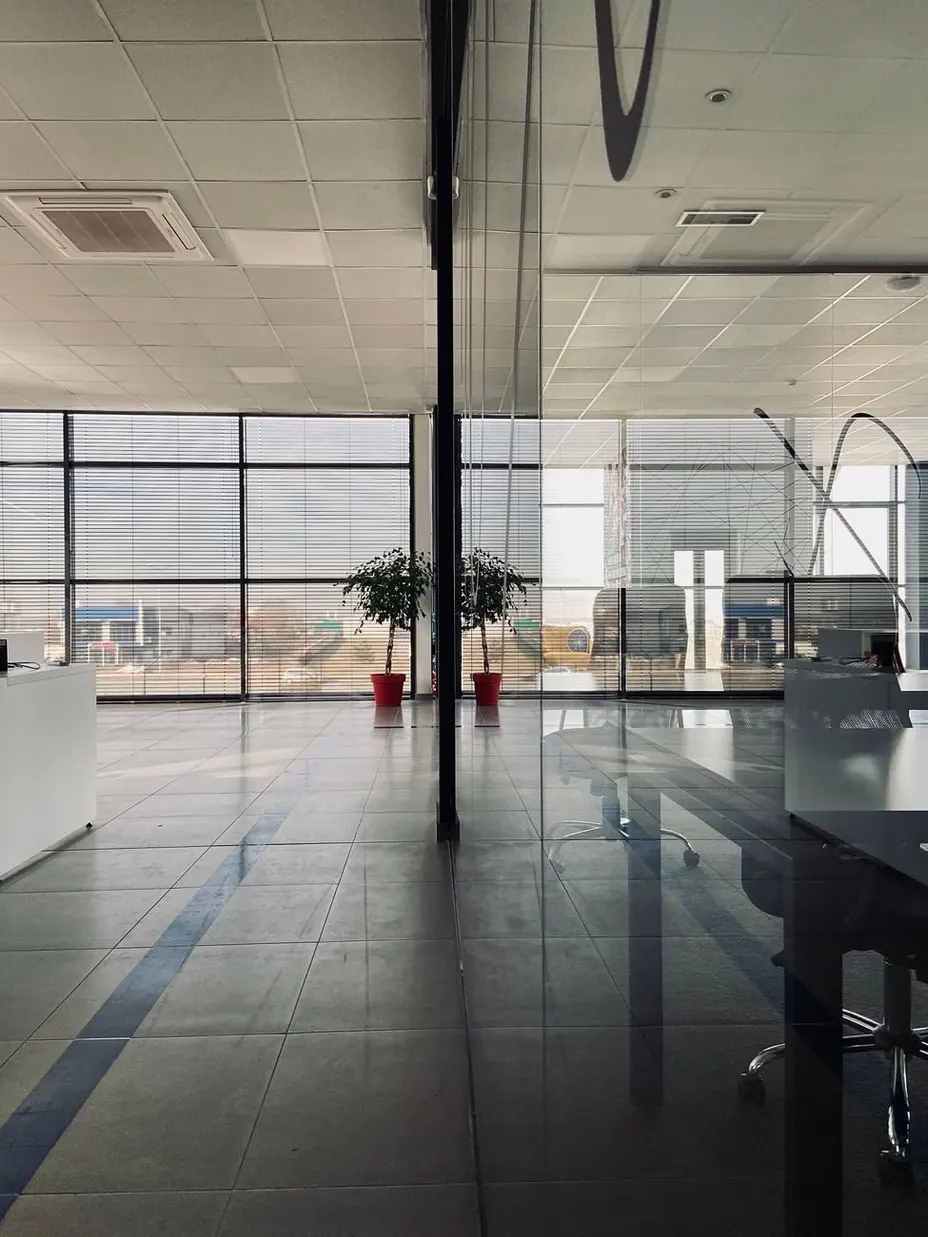 A bright glass office lobby