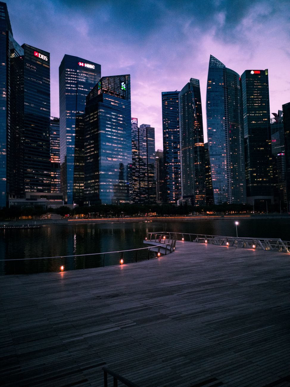 A financial district skyline at dusk